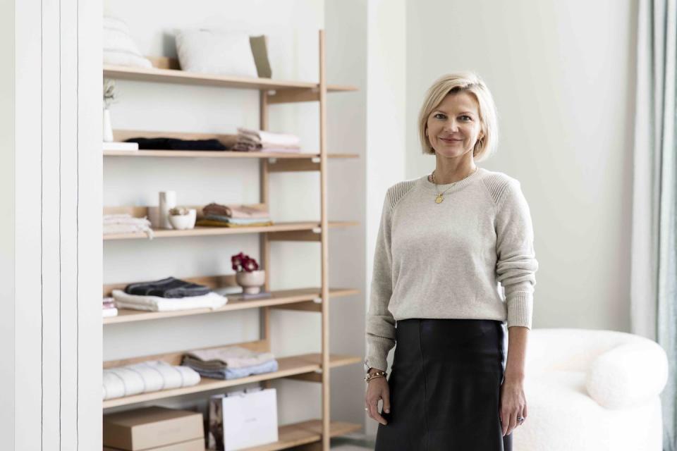 a woman standing in a room