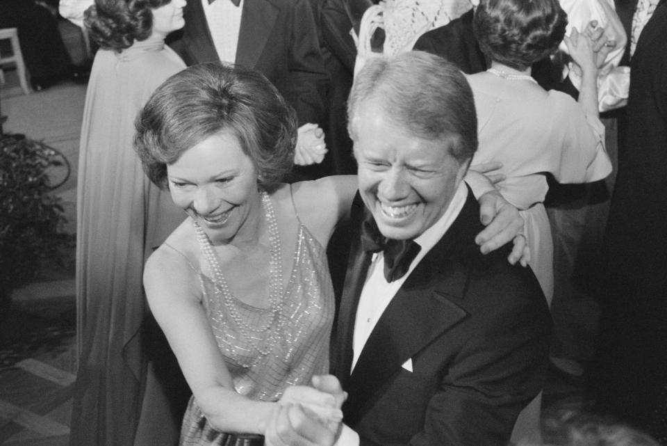 U.S. President Jimmy Carter and First Lady Rosalynn Carter dance at a White House Congressional Ball in Washington, D.C., on Dec, 13, 1978. / Credit: Marion S. Trikosko / Universal History Archive/Universal Images Group via Getty Images