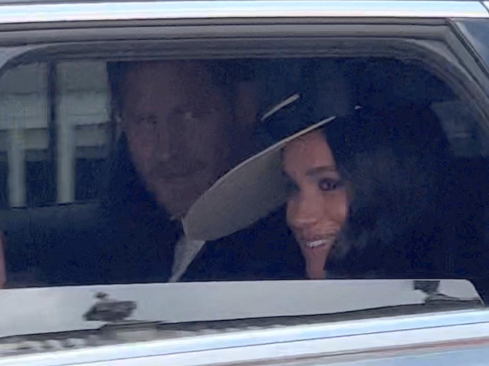 Meghan Markle arriving by car (Reuters)