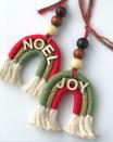 <p>Made of yarn, cotton rope, beads, and wooden letters, this elevated rainbow Christmas ornament is very pleasant to look at. Bonus: There's a <a href="https://go.redirectingat.com?id=74968X1596630&url=https%3A%2F%2Fwww.etsy.com%2Flisting%2F1079989774%2Fdiy-christmas-ornament-craft-kit-for&sref=https%3A%2F%2Fwww.housebeautiful.com%2Fentertaining%2Fholidays-celebrations%2Fg22675518%2Feasy-christmas-craft-ideas%2F" rel="nofollow noopener" target="_blank" data-ylk="slk:kit by Motley Bliss on Etsy;elm:context_link;itc:0;sec:content-canvas" class="link ">kit by Motley Bliss on Etsy</a> that comes with everything you need—including a printable PDF and a link to a how-to YouTube video.</p>