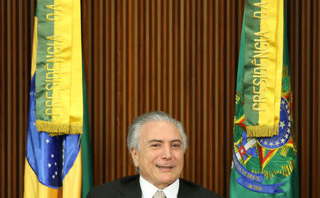 Brazil's new President Michel Temer attends a ministerial meeting after Brazil's Senate removed President Dilma Rousseff in Brasilia, Brazil, August 31, 2016. REUTERS/Adriano Machado