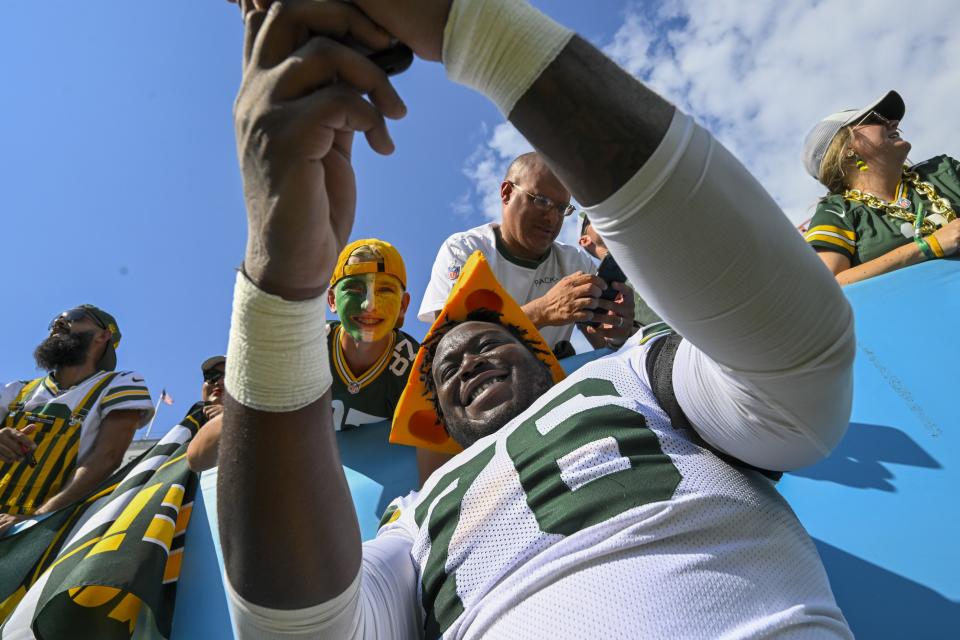 Green Bay Packers' Kadeem Telfort takes a selfie after an NFL football game against the Tennessee Titans Sunday, Sept. 22, 2024, in Nashville, Tenn. (AP Photo/John Amis)