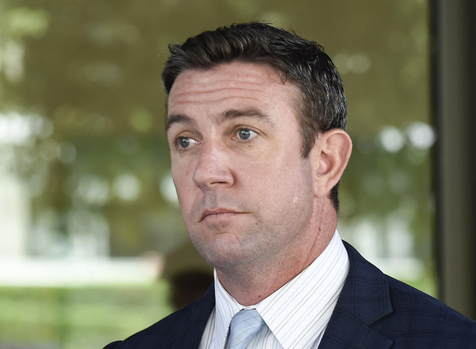 FILE - In this July 1, 2019 file photo U.S. Rep. Duncan Hunter leaves federal court after a motions hearing in San Diego. Former California Congressman Darrell Issa has taken a step toward challenging indicted U.S. Rep. Hunter for the Southern California seat. Issa says on his website that he formed an exploratory committee to replace fellow Republican Hunter, who is scheduled to be tried in January for allegedly siphoning campaign money for personal use. (AP Photo/Denis Poroy,File)