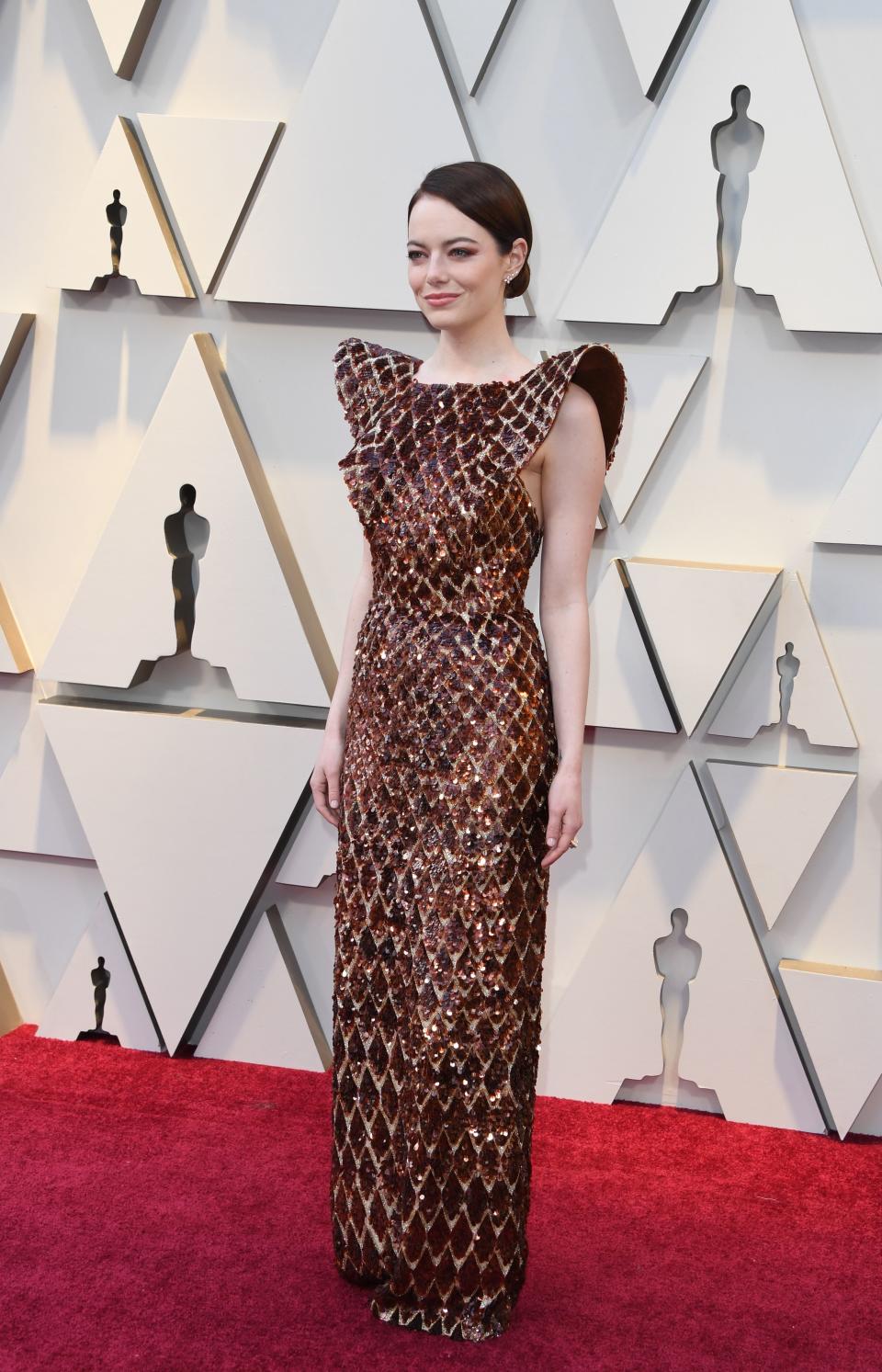 <h1 class="title">Emma Stone in Louis Vuitton</h1><cite class="credit">Photo: Getty Images</cite>