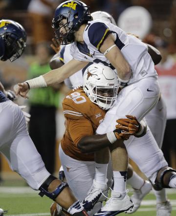 Malcom Brown (AP Photo/Eric Gay)