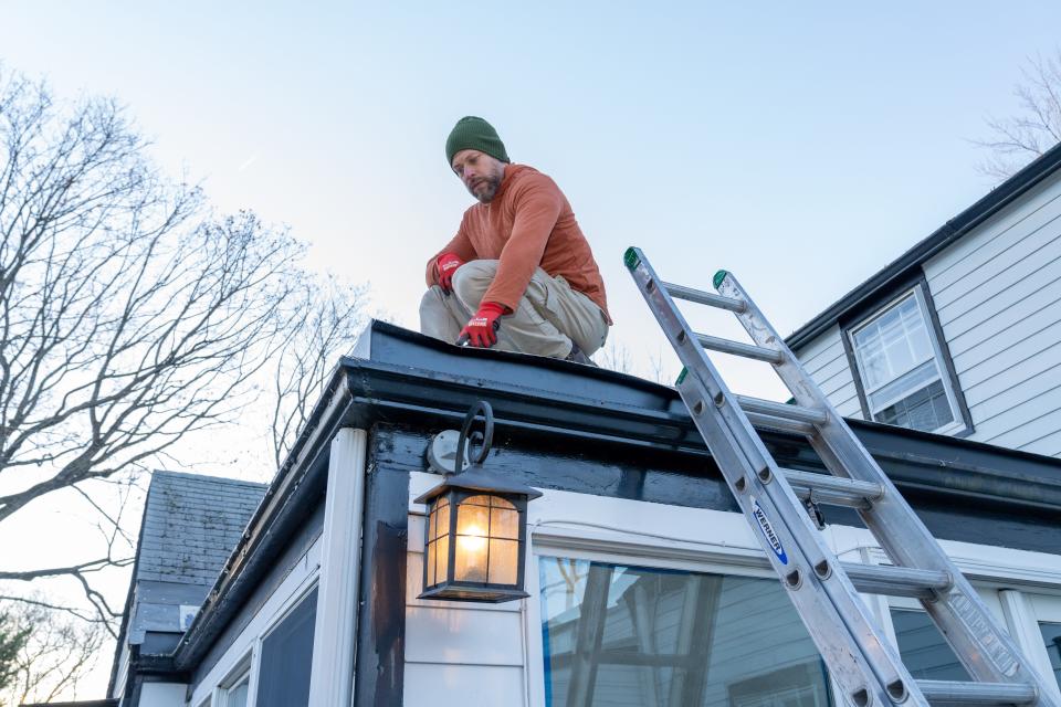 Home inspector Joe Mazza investigates the roof, as seen on HGTV's "Home Inspector Joe."