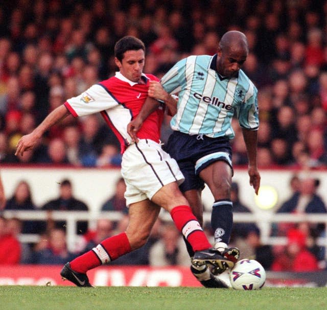 Remi Garde, left, spent three seasons with Arsenal as a player 