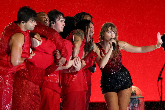 <p>John Shearer/TAS23/Getty</p> Taylor Swift onstage.