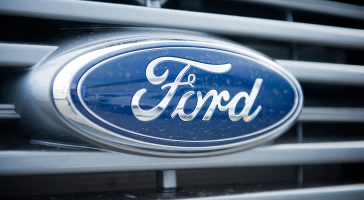 Ford (F) logo badge on grill of car