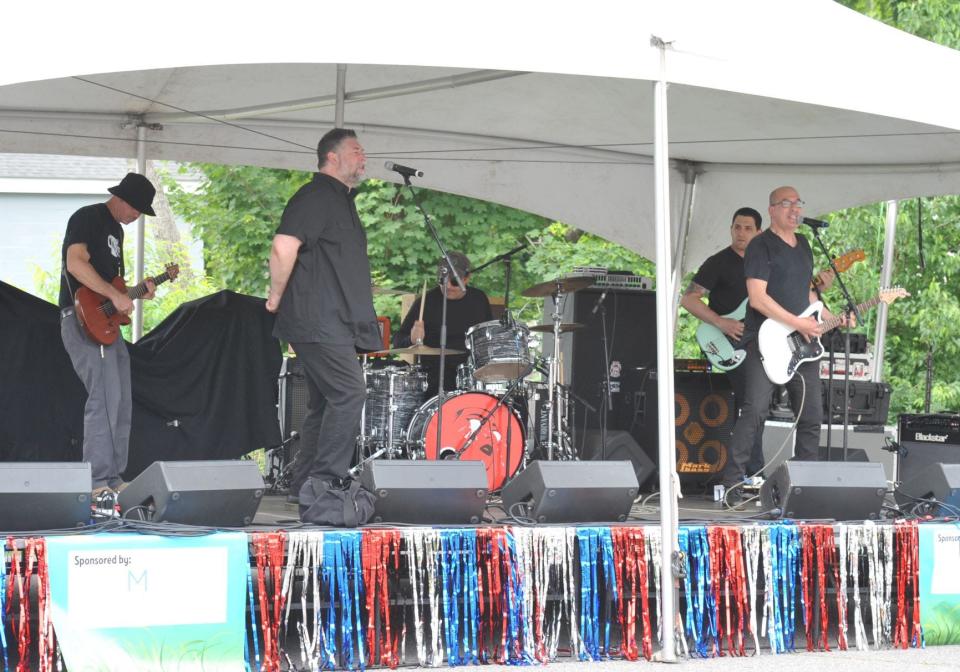 The band Totem, of Norwell, performs during Norwell Summer Fest 2022 on Saturday, June 11, 2022.