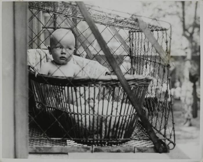 baby on a wire balcony