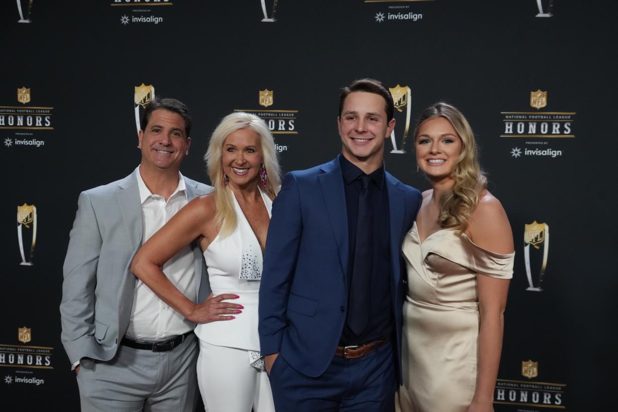 San Francisco 49ers quarterback Brock Purdy, second from right, poses for a photo with his parents, Shawn and Carrie, and fiancée Jenna Brandt, right, before the NFL Honors award show in Phoenix on Feb. 9.