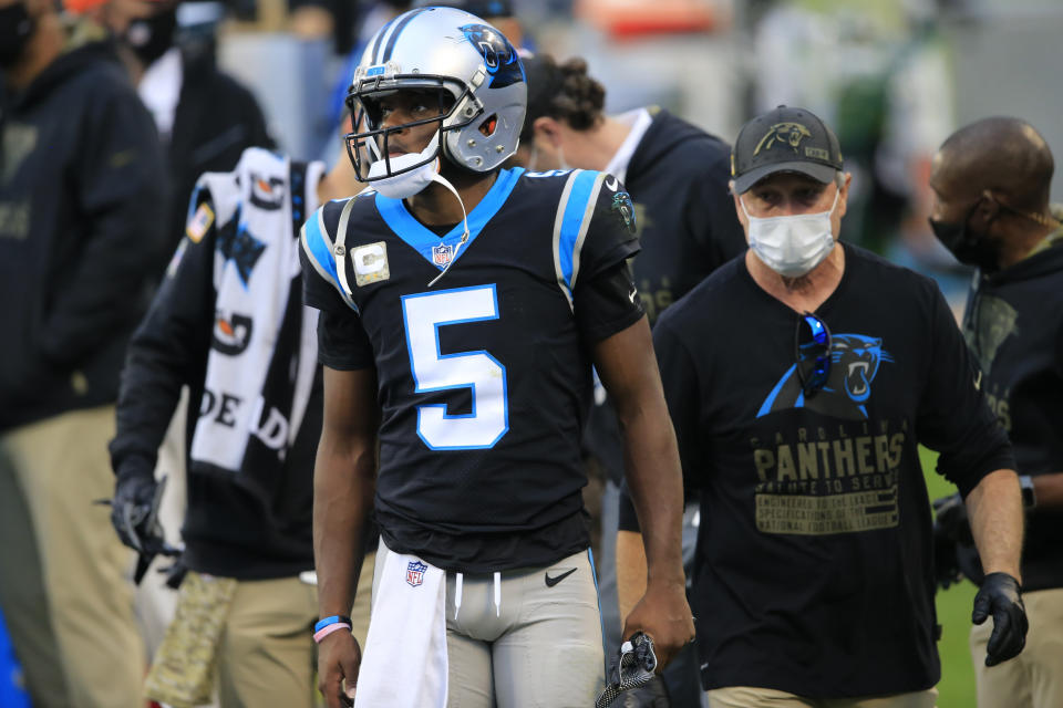 Carolina Panthers quarterback Teddy Bridgewater (5) walks off the field after being injured on a sack against the Tampa Bay Buccaneers during the second half of an NFL football game, Sunday, Nov. 15, 2020, in Charlotte, N.C. (AP Photo/Brian Blanco)