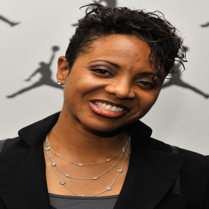 Close-up of MC Lyte smiling