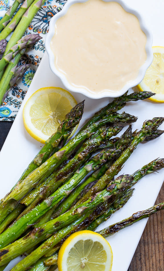 <strong>Get the <a href="http://spicysouthernkitchen.com/grilled-asparagus-with-wasabi-soy-dipping-sauce/" target="_blank">Grilled Asparagus with Wasabi Soy Dipping Sauce recipe</a> from Spicy Southern Kitchen</strong>