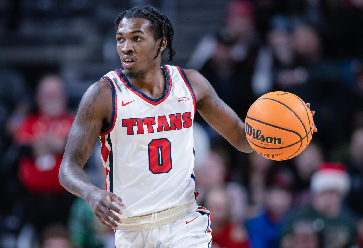 CINCINNATI, OH - DECEMBER 21: Antoine Davis #0 of the Detroit Mercy Titans brings the ball up court during the game against the Cincinnati Bearcats at Fifth Third Arena on December 21, 2022 in Cincinnati, Ohio. (Photo by Michael Hickey/Getty Images)