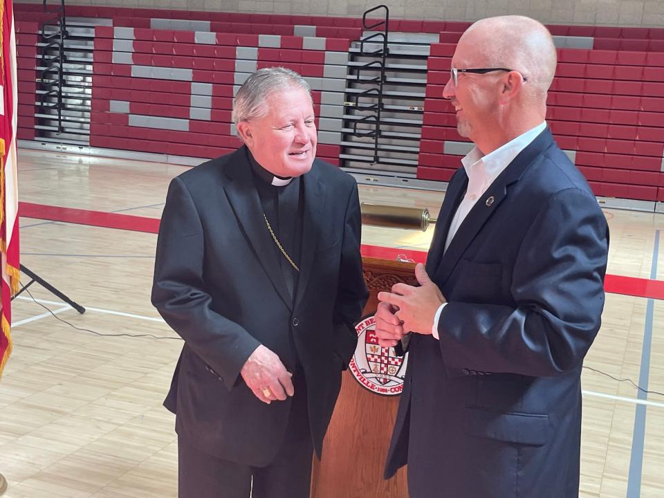 Diocese of Norwich Bishop Michael Cote talks with Mohegan Tribal Chairman James Gessner Jr. after a ceremony Wednesday where the Diocese of Norwich and the Mohegan Tribe discussed the return of ancestral land to the Mohegans, and the future of the school.