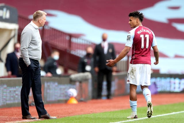 Ollie Watkins, right, was sent off against Manchester United on Sunday