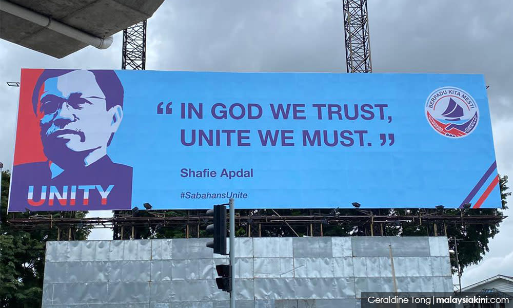 Kit Siang shocked Bung objects to 'In God we trust' slogan