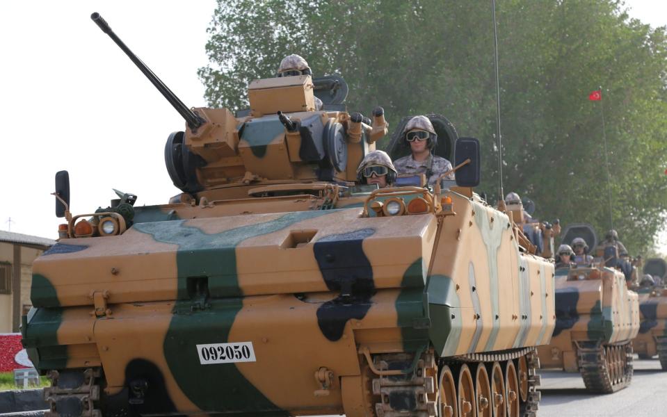 Qatar's neighbours were angered by footage of Turkish armoured vehicles rolling through Doha - REUTRES