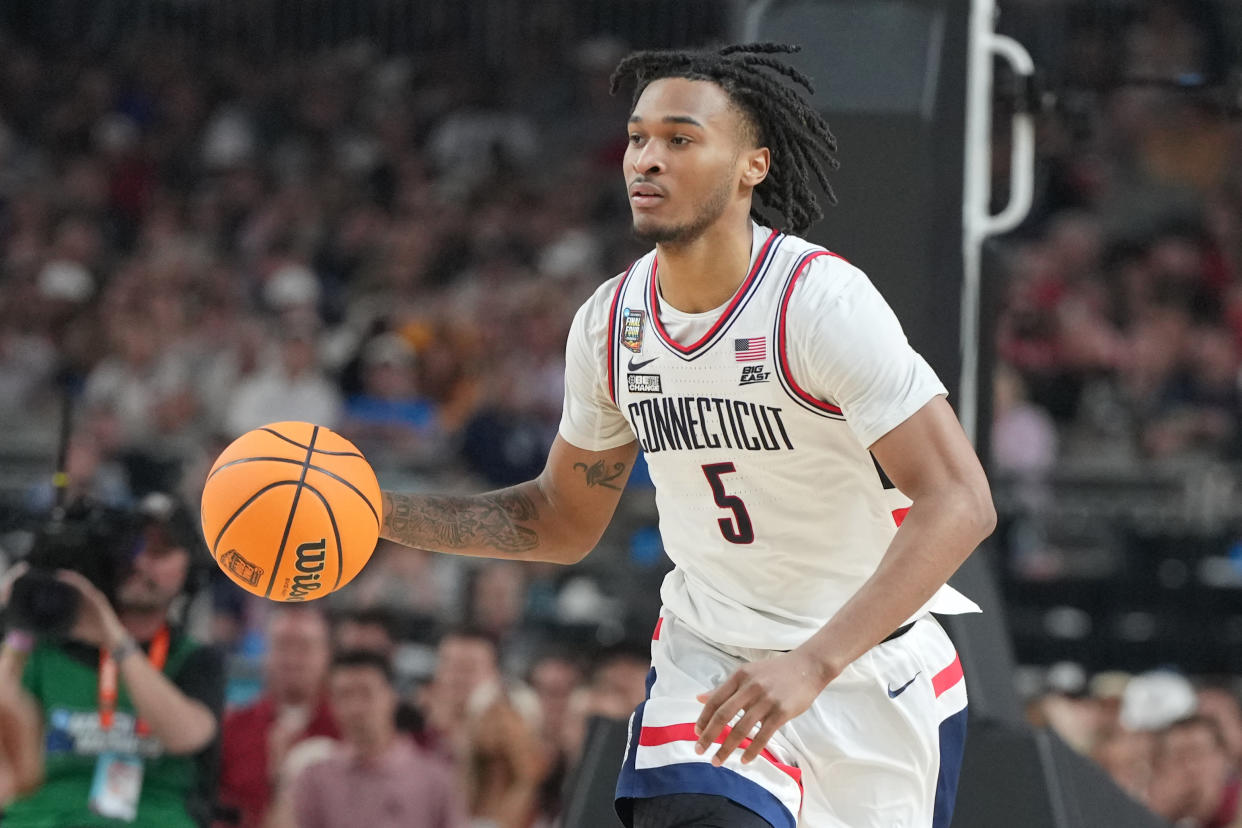 Stephon Castle averaged 11.2 points, 4.3 rebounds and 3 assists per game for the Huskies during the 2023-24 season, helping the program to a second straight national title. (Photo by Mitchell Layton/Getty Images)