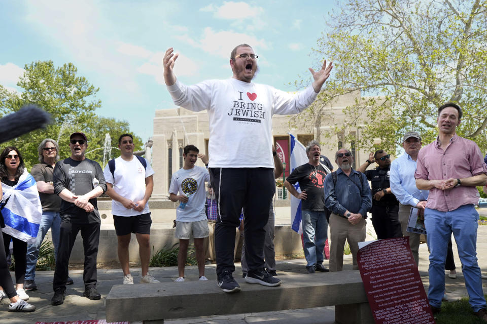 Rabbi Levi Cunin, with Chabad on Campus, speaks during a pro-Israel rally at Indiana University in Bloomington, Ind., Thursday, May 2, 2024. (AP Photo/AJ Mast)