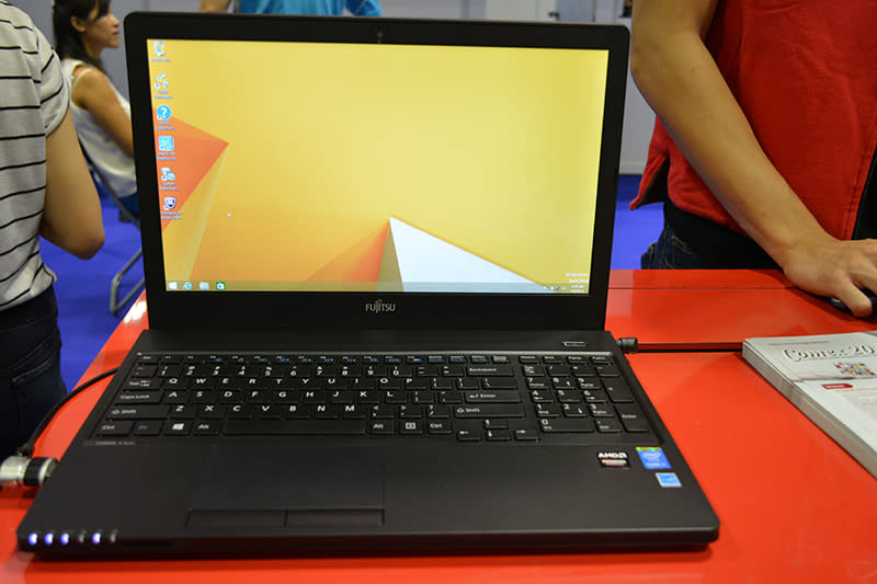 The Fujitsu Lifebook AH555 is powered by a 2.4GHz Intel Core i7-5500U processor and an AMD Radeon R7 M260 mobile graphics card. It is also equipped with 8GB of DDR3 1600MHz RAM (upgradeable to 16GB) and a 500GB + 8GB hybrid SSD with Windows 8.1 pre-installed. The 15.6-inch display boasts a Full HD 1920 x 1080 resolution, with a webcam capable of capturing 1080p video located on top. It comes with a free upgrade to a three-year warranty and a Fujitsu carrier case. It can be had for $1,588, down from a usual price of $2,083. 