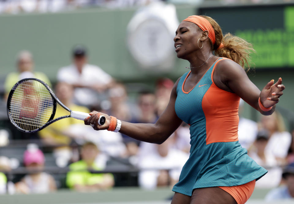 Serena Williams reacts after losing a point to Maria Sharapova, of Russia, at the Sony Open Tennis tournament in Key Biscayne, Fla., Thursday, March 27, 2014. (AP Photo/Alan Diaz)