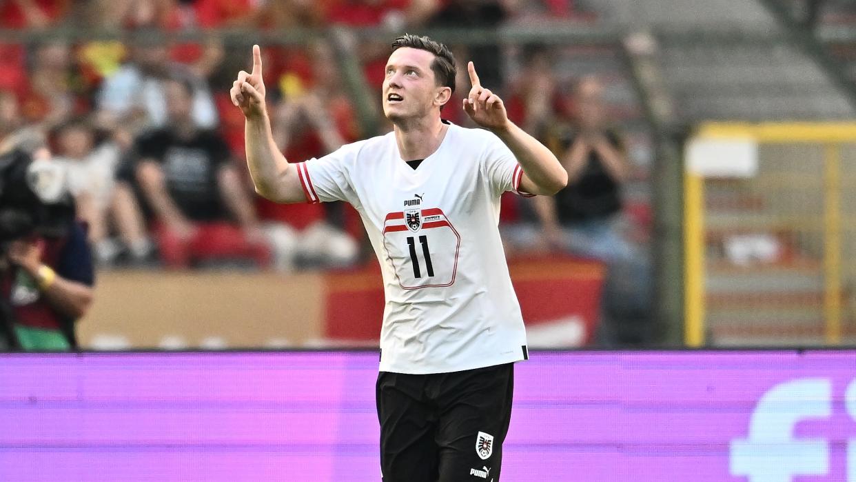  Michael Gregoritsch of Austria celebrates after scoring opening goal during the UEFA European Qualifiers 2024 match between Belgium and Austria 