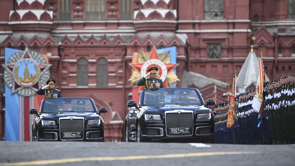 Russian Defence Minister Sergei Shoigu salutes soldiers as he is driven along Red Square. - Alexander Nemenov/AFP/Getty Images