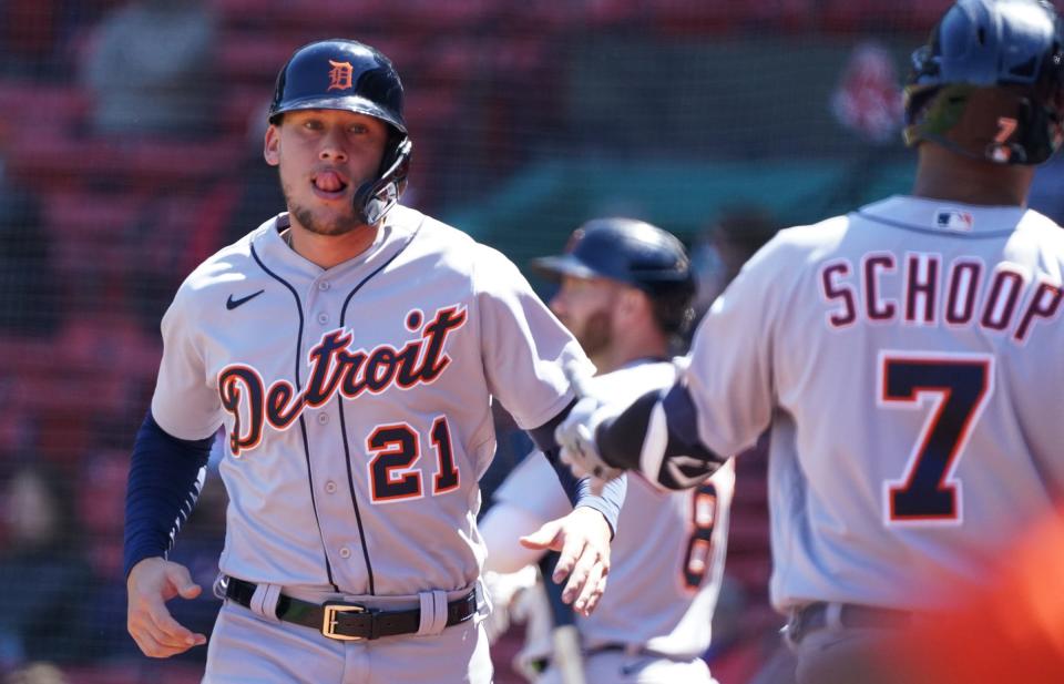 Detroit Tigers left fielder JaCoby Jones (21) scores on a sacrifice out by center fielder Akil Baddoo (60) (not pictured) against the Boston Red Sox in the third inning at Fenway Park.