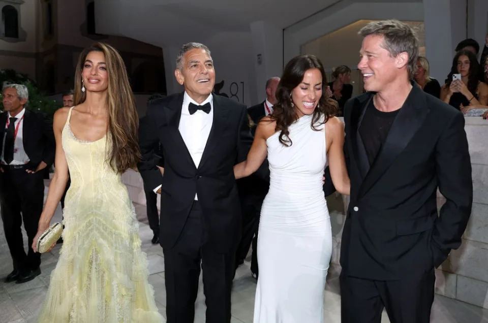 mal Clooney, George Clooney, Ines de Ramon and Brad Pitt attend the "Wolfs" red carpet during the 81st Venice International Film Festival on September 01, 2024 in Venice, Italy.