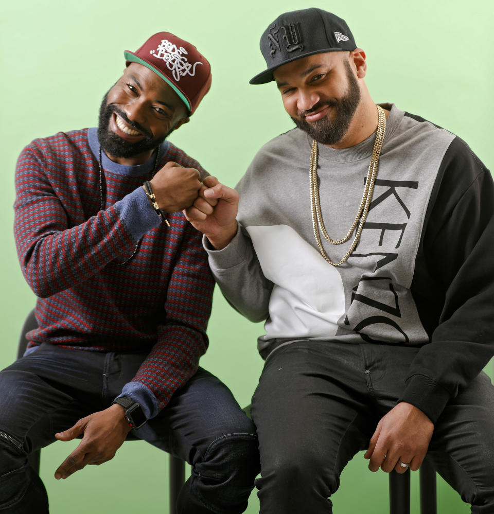 This March 19, 2019 photo shows Daniel Baker, better known as Desus Nice, left, and Joel Martinez, also known as The Kid Mero, during a portrait session in New York. The pair host the late night series "Desus & Mero," on Showtime. (Photo by Brian Ach/Invision/AP)