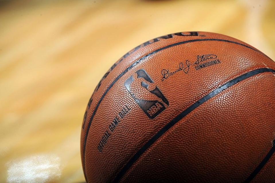 Close-up of a textured basketball with the NBA commissioner's signature