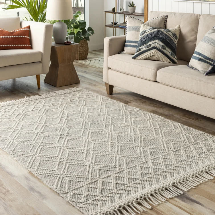 Omar Handmade Flatweave Grey Rug. Image via Wayfair.