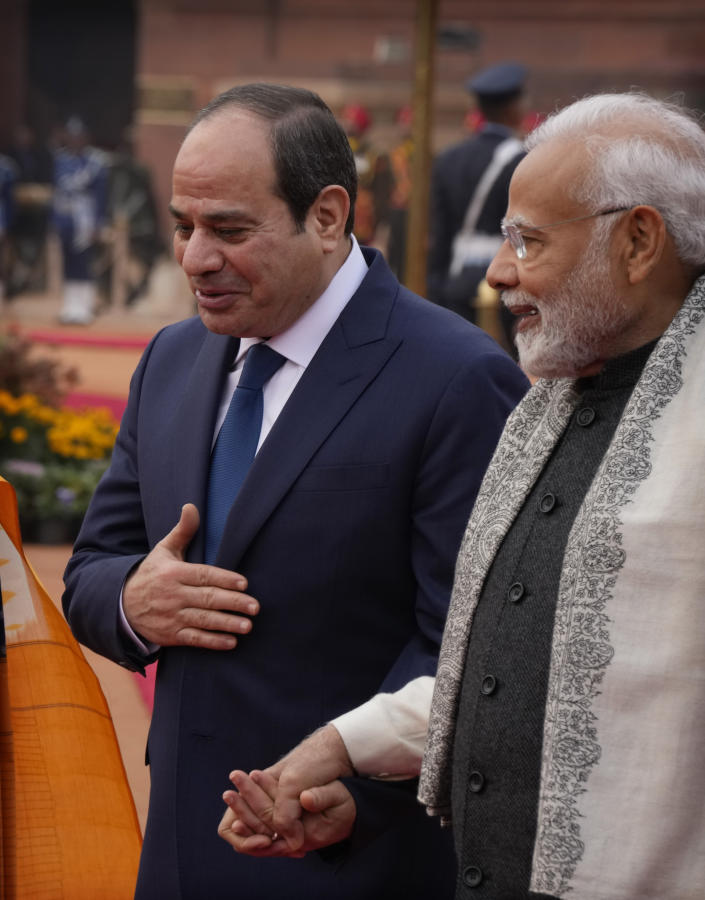 Indian Prime Minister Narendra Modi talks with Egyptian President Abdel Fattah El-Sisi during latter's ceremonial reception at the Indian presidential palace, in New Delhi, India, Wednesday, Jan. 25, 2023. El-Sisi will be the Chief Guest on the country's annual Republic Day parade on Thursday. (AP Photo/Manish Swarup)