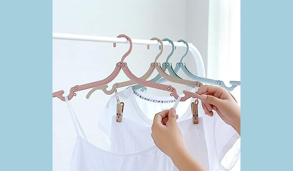 Hang your entire travel wardrobe with these clever foldaway hangers. (Photo: Amazon)