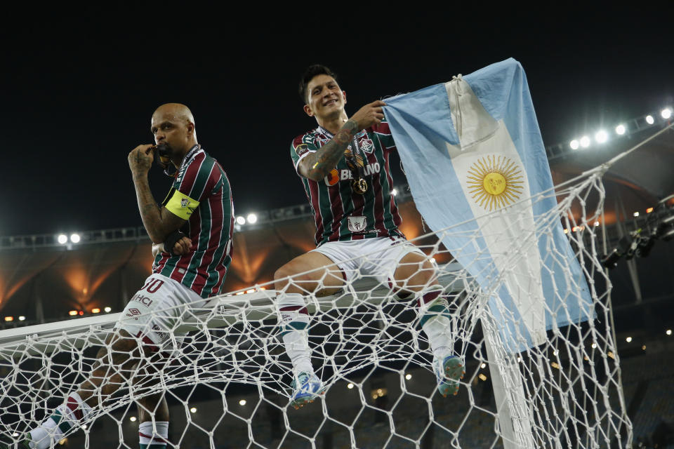 German Cano of Brazil's Fluminense, right, who is from Argentina, celebrates after beating Argentina's Boca Juniors in the final soccer match of the Copa Libertadores at Maracana stadium in Rio de Janeiro, Brazil, Saturday, Nov. 4, 2023. (AP Photo/Bruna Prado)