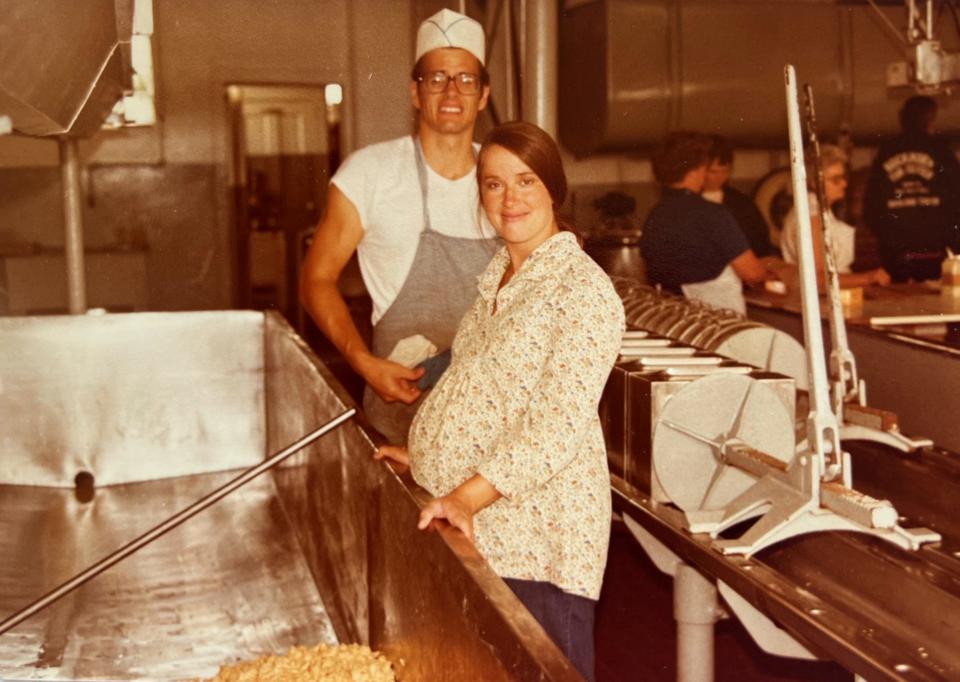 Dave and Jan Metzig are photographed in the late spring of 1980 in Union Star Cheese Factory, which they purchased earlier that year. Jan is pregnant with her third son, Louie, who was born June 7, 1980.