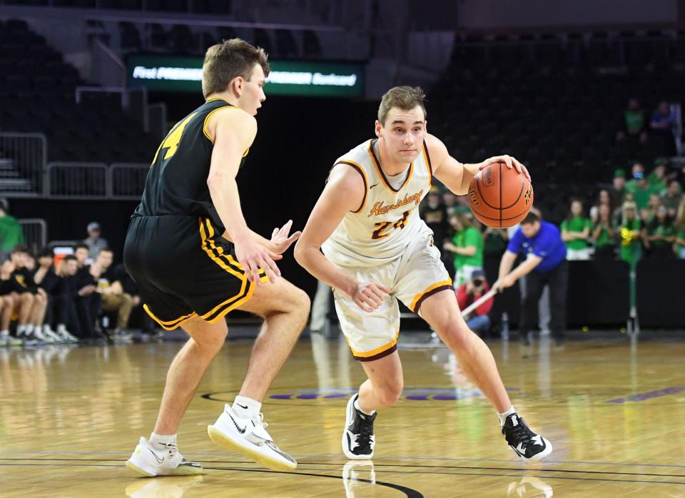 Harrisburg's Jacoby Mehrman dribbles across the court in the first round of the high school boys state basketball tournament on Thursday, March 17, 2022, at the the Denny Sanford Premier Center in Sioux Falls.