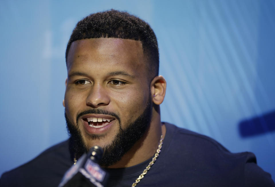 Los Angeles Rams' Aaron Donald answers questions during Opening Night for the NFL Super Bowl 53 football game, Monday, Jan. 28, 2019, in Atlanta. (AP Photo/Matt Rourke)