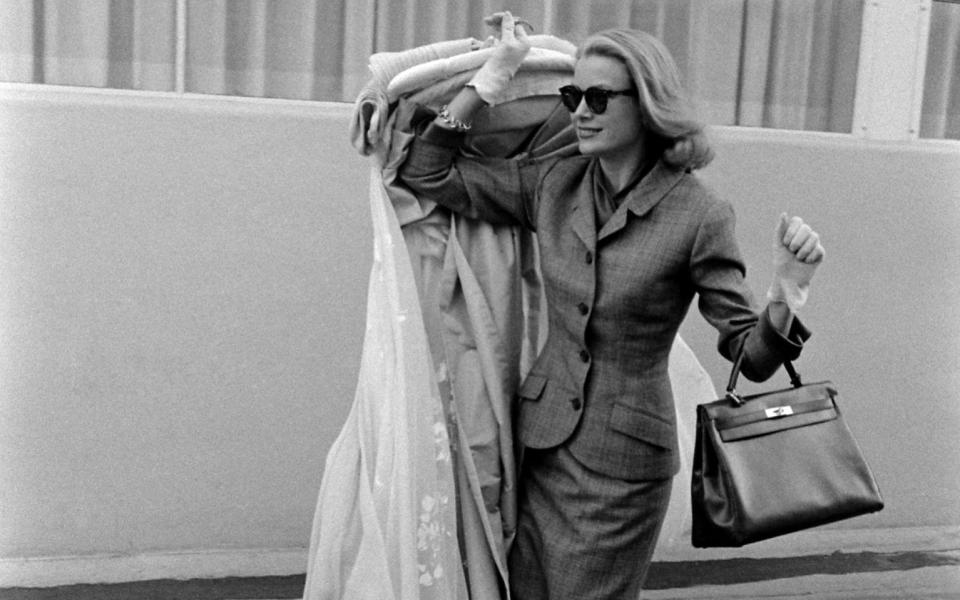 The actor Grace Kelly with her signature Kelly handbag – a style Hermès named after her - in 1956 - Getty