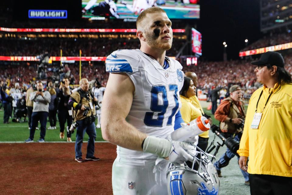 Lions defensive end Aidan Hutchinson walks off the field after the Lions' 34-31 loss in the NFC championship game in Santa Clara, California, on Sunday, Jan. 28, 2024.