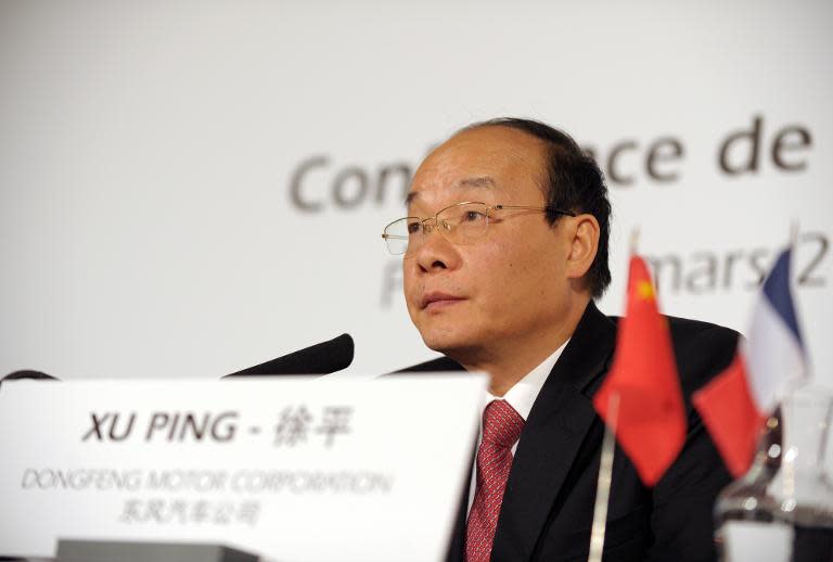 Chairman of Dongfeng Motor Corp., Xu Ping, pictured during a press conference in Paris, in March 2014