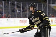 FILE - In this Oct. 11, 2019, file photo, Western Michigan forward Austin Rueschhoff (22) skates Ohio State during an NCAA college hockey game in Toledo, Ohio. Rueschhoff signed with the New York Rangers recently. (AP Photo/Rick Osentoski, File)