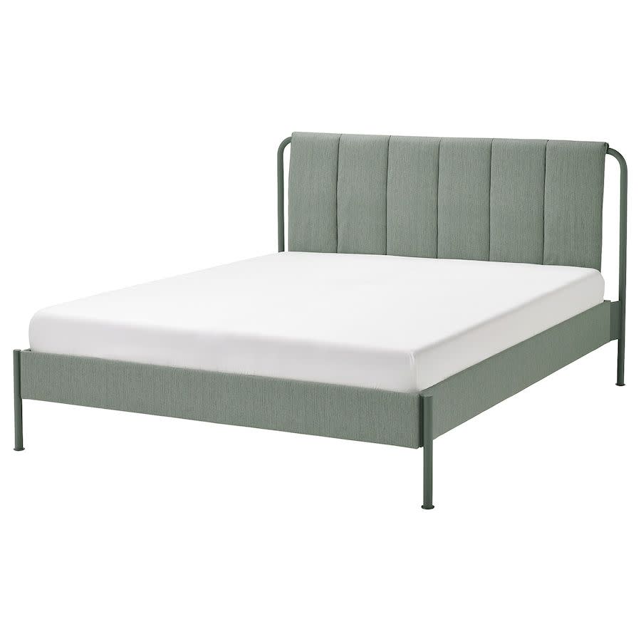 <p><a href="https://www.ikea.com/us/en/p/taellasen-upholstered-bed-frame-kulsta-gray-green-luroey-s59514762/" rel="nofollow noopener" target="_blank" data-ylk="slk:Shop Now;elm:context_link;itc:0;sec:content-canvas" class="link rapid-noclick-resp">Shop Now</a></p><p>TÄLLÅSEN upholstered bed frame</p><p>ikea.com</p><span class="copyright">Hearst Owned</span>