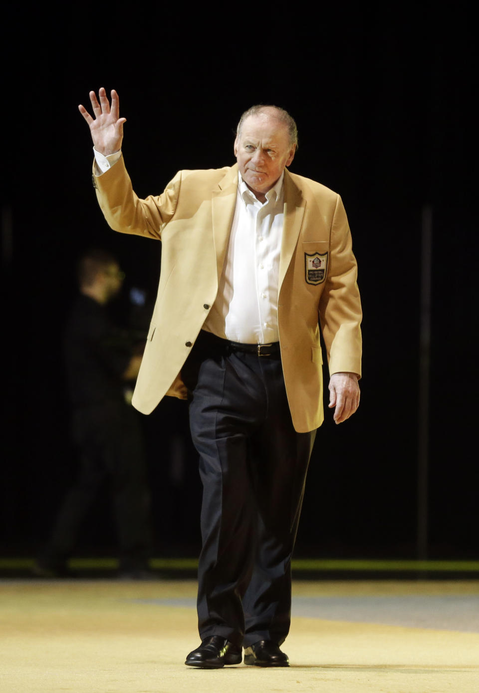 FILE - Len Dawson is introduced before the inaugural Pro Football Hall of Fame Fan Fest Friday, May 2, 2014, at the International Exposition Center in Cleveland. Hall of Fame quarterback Len Dawson, who helped the Kansas City Chiefs to a Super Bowl title, died Wednesday, Aug. 24, 2022. He was 87. (AP Photo/Mark Duncan, File)