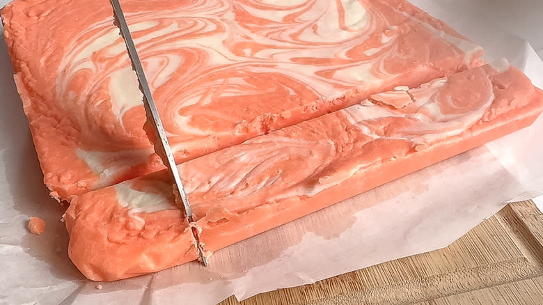 slicing orange cream fudge