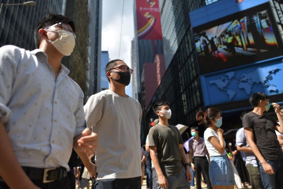 Face masks have been banned in Hong Kong following protests [Photo: Getty]