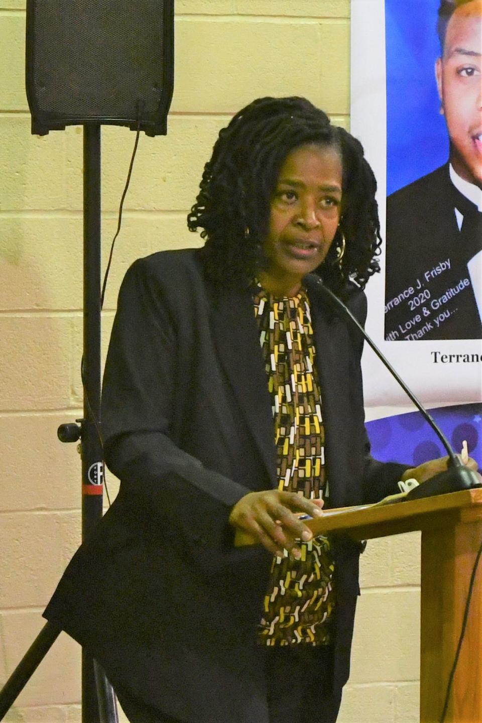 Amy Handy, seen speaking at a meeting at the former Paul Laurence Dunbar Elementary School on Nov. 12, 2023, is the organizer of Operation West Laurel.